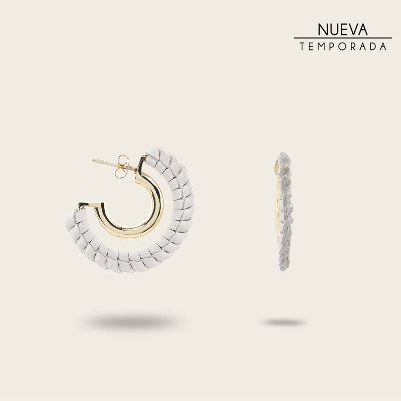 Arracadas en piel genuina para dama. product image